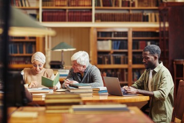 Library Scene with Individuals at Desks